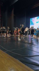 Children's dance troupe performs on stage in Novosibirsk