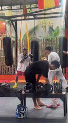 Boxing training session captured at outdoor gym in Kuta Selatan
