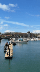 Sunny day captured at Weymouth marina with docked boats
