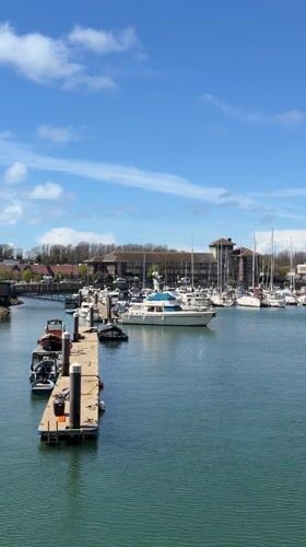 Sunny day captured at Weymouth marina with docked boats