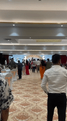Formal wedding celebration with musicians held in Mumbai banquet hall