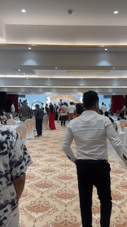 Formal wedding celebration with musicians held in Mumbai banquet hall