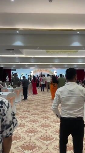 Formal wedding celebration with musicians held in Mumbai banquet hall