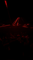 Paris nightclub features geometric laser show, dancing crowd