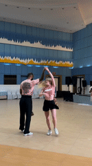 Couple performs coordinated dance routine in Pattaya hall