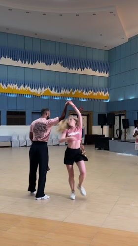 Couple performs coordinated dance routine in Pattaya hall