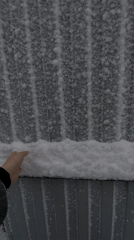 Spring snowfall documented in Ольховка, Russia during early morning