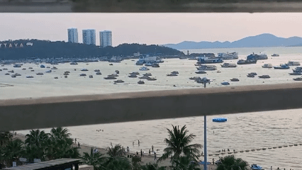 Elevated views capture busy Pattaya Bay and beach scene