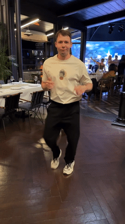 Evening dancing celebration captured at upscale Batumi venue