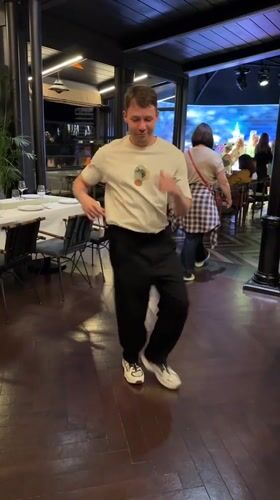Evening dancing celebration captured at upscale Batumi venue