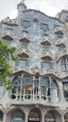 Tourist documents Gaudí's Casa Batlló architecture and interior details