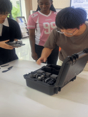 Students assemble drone during late-night session in Jiangjin classroom