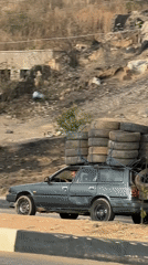Overloaded tire transport vehicle spotted on Jos roadway