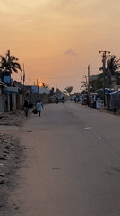 Evening street life documented in Narayi, Nigeria at sunset