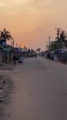 Evening street life documented in Narayi, Nigeria at sunset