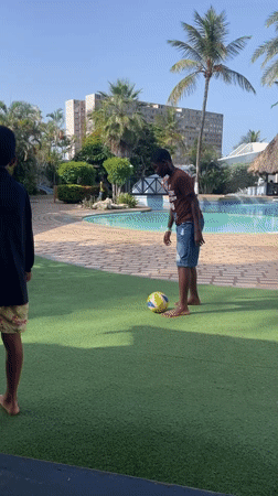 Pickup soccer and poolside downtime at a Porlamar resort