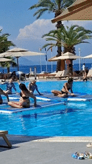 Poolside yoga and coastal scenes at a Kemer resort