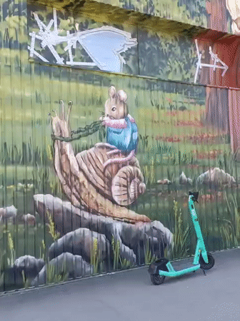 Tallinn street murals: quirky animal characters across corrugated walls