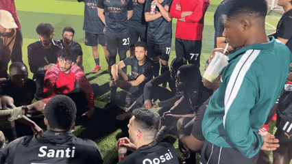 Soccer team holds huddle meeting at Chongqing sports complex