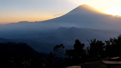 Volcanic sunrise over Abang, Bali, mist and golden light