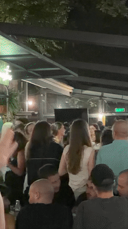 Lively outdoor bar night in Tbilisi