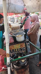 Street food and matcha stalls doing steady trade in Suwaluh