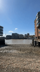 River view captured from London foreshore under clear skies