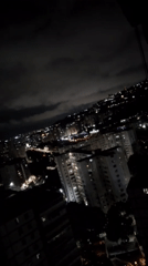 Nighttime Views of Illuminated Caracas Cityscape Recorded by Witnesses