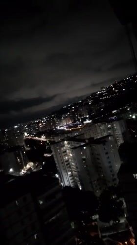 Nighttime Views of Illuminated Caracas Cityscape Recorded by Witnesses