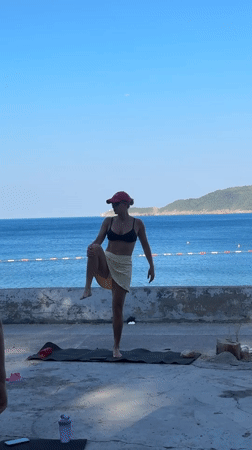 Group resistance band workout on the Montenegro waterfront