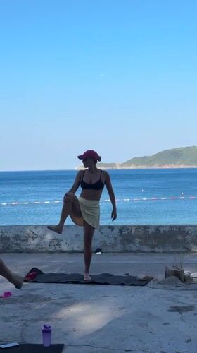 Group resistance band workout on the Montenegro waterfront