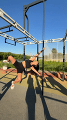 Woman performs pole acrobatics at Moscow riverside fitness park