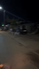 Nighttime motorcycle ride captured in Guzape, Nigeria streets