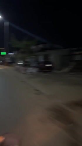 Nighttime motorcycle ride captured in Guzape, Nigeria streets