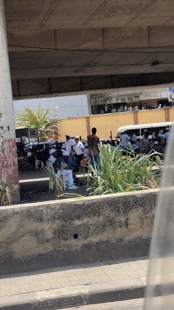 Community gathering under Lagos overpass draws crowd with chairs