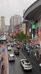 Rainy day street life documented across Tianhe District, Guangzhou