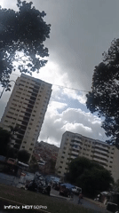 Ordinary street life documented across Caracas during evening hours