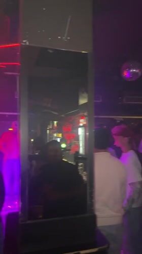 Night out captured at Hilversum club with dancing crowds
