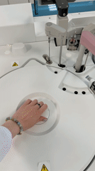 Moscow lab technicians operate automated medical analyzers during morning shift
