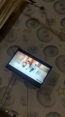 Television documented in decorated room in Jos, Nigeria