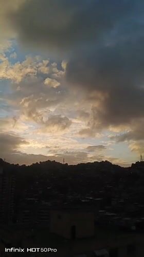 Evening snapshots document daily life across Caracas neighborhoods