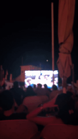 Tel Aviv crowd watches outdoor soccer screening on a summer night