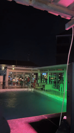Poolside party documented through selfies and dining in Awka