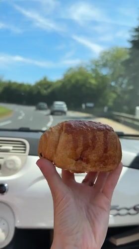 Pain au chocolat break inside a Fiat 500 in Normandy