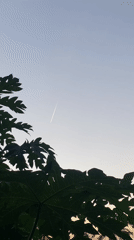 Aircraft contrails observed across evening sky in Achara, Nigeria