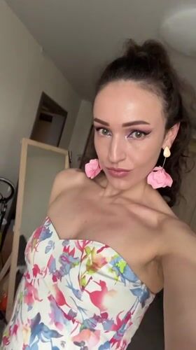 Woman Takes Morning Selfies in Floral Dress, Kazan