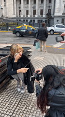 Two women pose for street photos in Buenos Aires