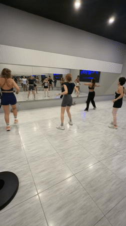 Dance fitness class in session at a Choeng Mon studio