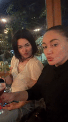 Women celebrate with cocktails at Montenegro bar