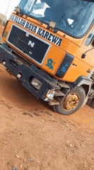 Orange dump truck with Arabic text spotted in Bukuru